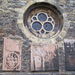 Kouřim, kostel svatého Štěpána, náhrobní desky a kulaté okno